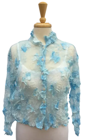 Crinkle 12 Long-sleeve, button-up crinkle top with allover butterfly detailing. Sheer. Made in France.